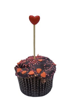 homemade valentine cupcakes with red sugar hearts, chocolate muffin with heart, symbol of love