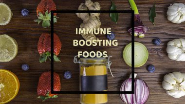 Bağışıklık sistemini güçlendirmek için süper yiyecekler, antioksidan, mineral, ahşap arka planda vitamin, sağlıklı yaşam tarzı, detoks, diyet konsepti açısından zengin sağlıklı gıda seçimi.