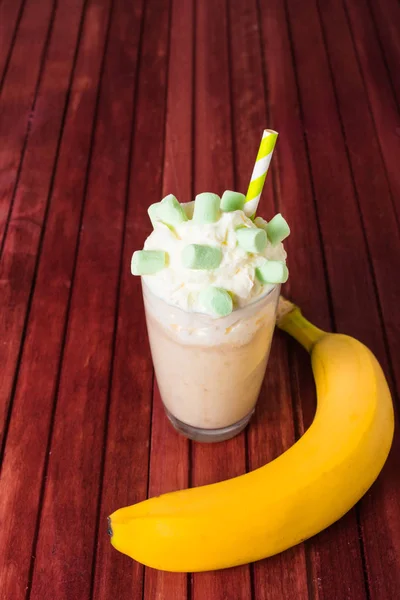 Banana milkshake with marshmallow and banana