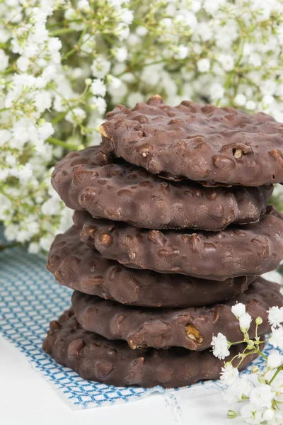 Cookies stack on tissue over white background