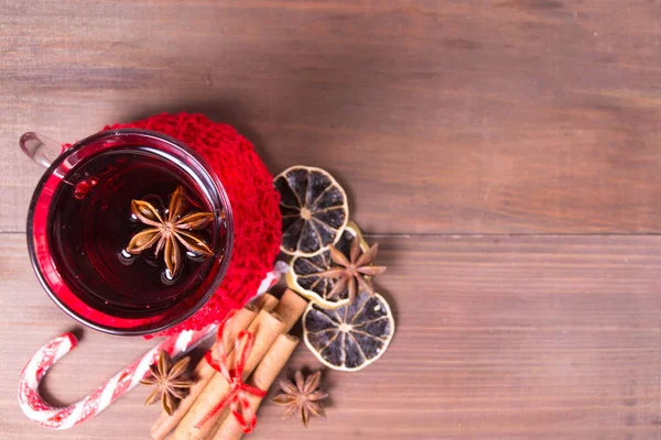 Overhead view of christmas hot drink with citrus and cinnamon