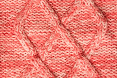 Kırmızı süveter desenli arka plan. Kış için tekstil yün giysiler. Dikey