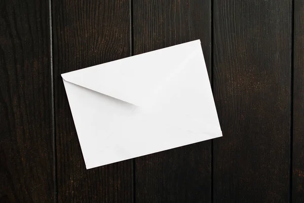 White closed envelope. Empty letter. Paper mail for note