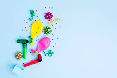 Blue birthday background with colorful bows, baloons, streamers and confetti