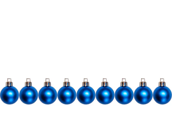 Row of blue New Year and Christmas balls isolated — Stock Photo, Image