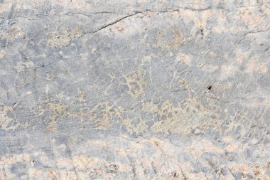 Beton duvar dokusu arka planı. Doğal taşlar. Binanın ön cephesi. Dekoratif alçı. Evin dışı..