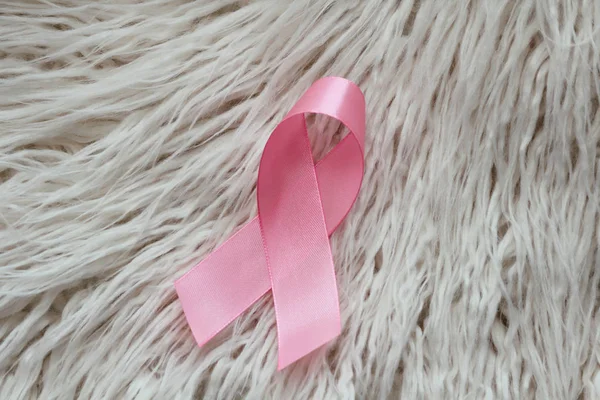 Pink ribbon. Symbol of breast cancer awareness. Health care conception. Preventive measures. October checking time. Women health.