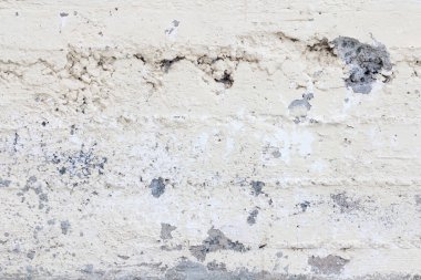 Beton duvar dokusu arka planı. Doğal taşlar. Binanın ön cephesi. Dekoratif alçı. Evin dışı..