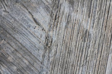 Beton duvar dokusu arka planı. Doğal taşlar. Binanın ön cephesi. Dekoratif alçı. Evin dışı..