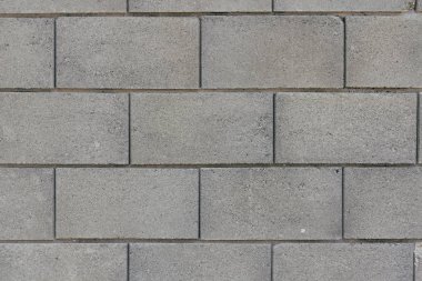 Beton duvar dokusu arka planı. Doğal taşlar. Binanın ön cephesi. Dekoratif alçı. Evin dışı..