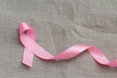 Pembe kurdele. Göğüs kanseri farkındalığının sembolü. Sağlık sigortası gebeliği. Önleyici önlemler. Ekim kontrol zamanı. Kadın sağlığı.