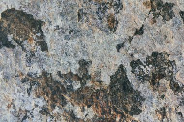 Beton duvar dokusu arka planı. Doğal taşlar. Binanın ön cephesi. Dekoratif alçı. Evin dışı..