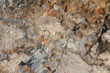 Beton duvar dokusu arka planı. Doğal taşlar. Binanın ön cephesi. Dekoratif alçı. Evin dışı..