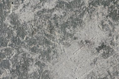 Beton duvar dokusu arka planı. Doğal taşlar. Binanın ön cephesi. Dekoratif alçı. Evin dışı..