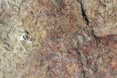 Beton duvar dokusu arka planı. Doğal taşlar. Binanın ön cephesi. Dekoratif alçı. Evin dışı..