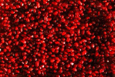 Taze kırmızı nar tohumları. Gıda dokusu geçmişi. Organik süper yiyecekler.