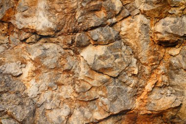 Beton duvar dokusu arka planı. Doğal taşlar. Binanın ön cephesi. Dekoratif alçı. Evin dış tarafı. 3B tasarım için duvar şablonu.