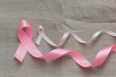 Pembe kurdele. Göğüs kanseri farkındalığının sembolü. Sağlık sigortası gebeliği. Önleyici önlemler. Ekim kontrol zamanı. Kadın sağlığı. Metin uzayı. 