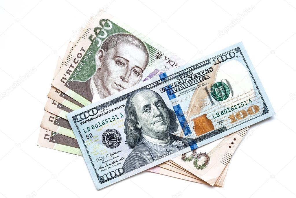 Two thousand five hundred Ukrainian hryvnia and one hundred dollars, on a white background