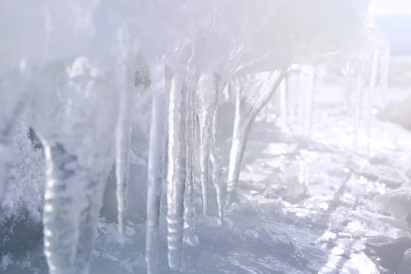 Ice with transparent icicles. Winter time at Lake Baikal — Stock Photo, Image