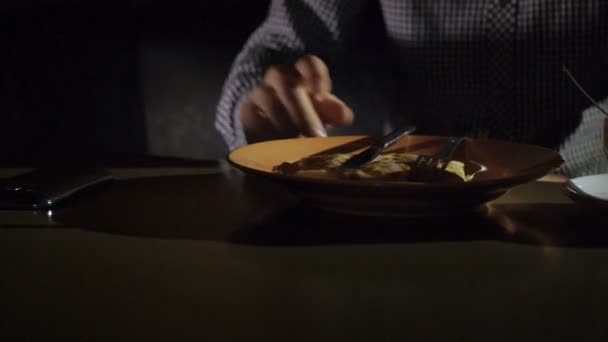 Young man stirring tea with spoon — Stock Video