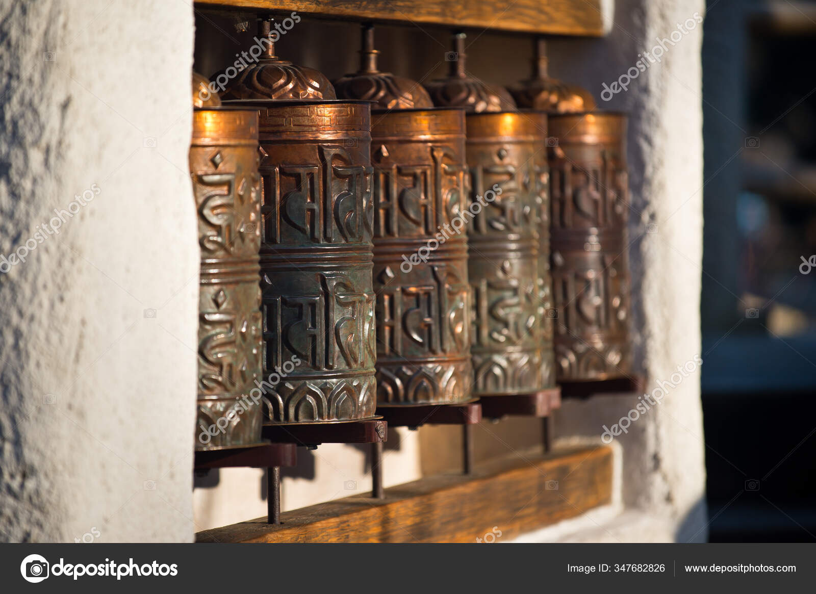 Modern Prayer Wheel Background Stock Photo by ©vojtaheroutcom 347682826