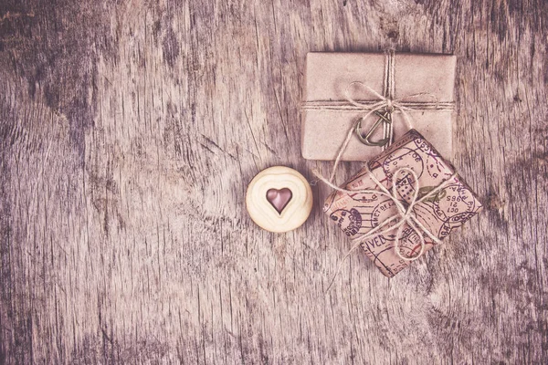 Two gift boxes and a heart cookie. Romantic concept. Cookies of valentine. Copy space