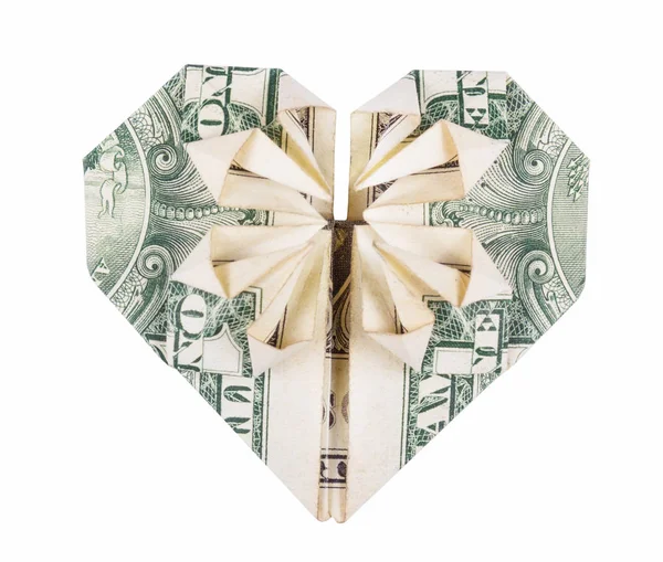 Heart of origami from the dollar. Origami of money. Dollar folded into heart isolated on white background. Valentine\'s heart.