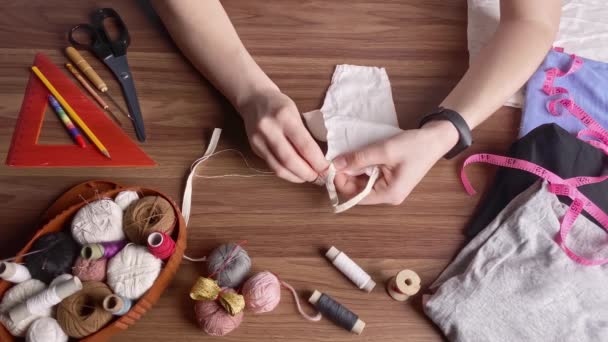 Hands Young Caucasian Woman Sewing Thimble White Cotton Fabric Night — Stock Video