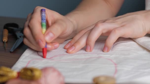 Young Tailor Uses Red Pencil Transfer Patterns White Tissue Close — Stock Video