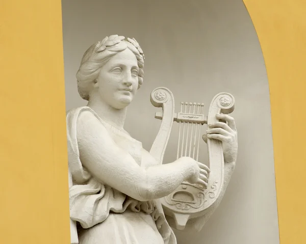 Sculpture of woman with lyre. — Stock Photo, Image