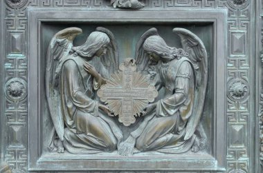 İncil'den karakter bas-reliefs.