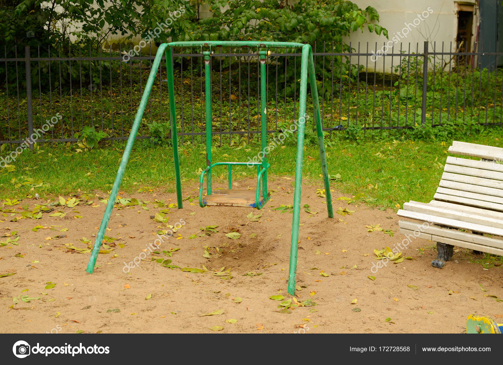 Baby Swings At The Playground In The Park Stock Photo