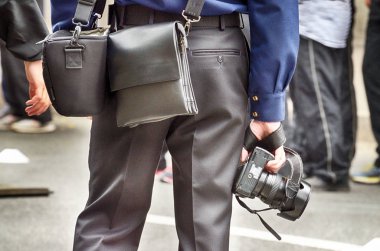 Atama düzenleyicisinden bir fotoğrafçı.