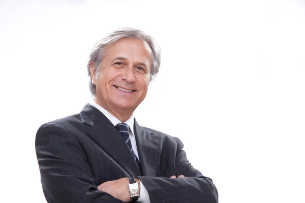 Elegante sonriente hombre de negocios senior aislado en blanco — Foto de Stock