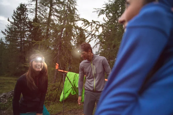 Woman and man with headlamp flashlight — Stock Photo, Image