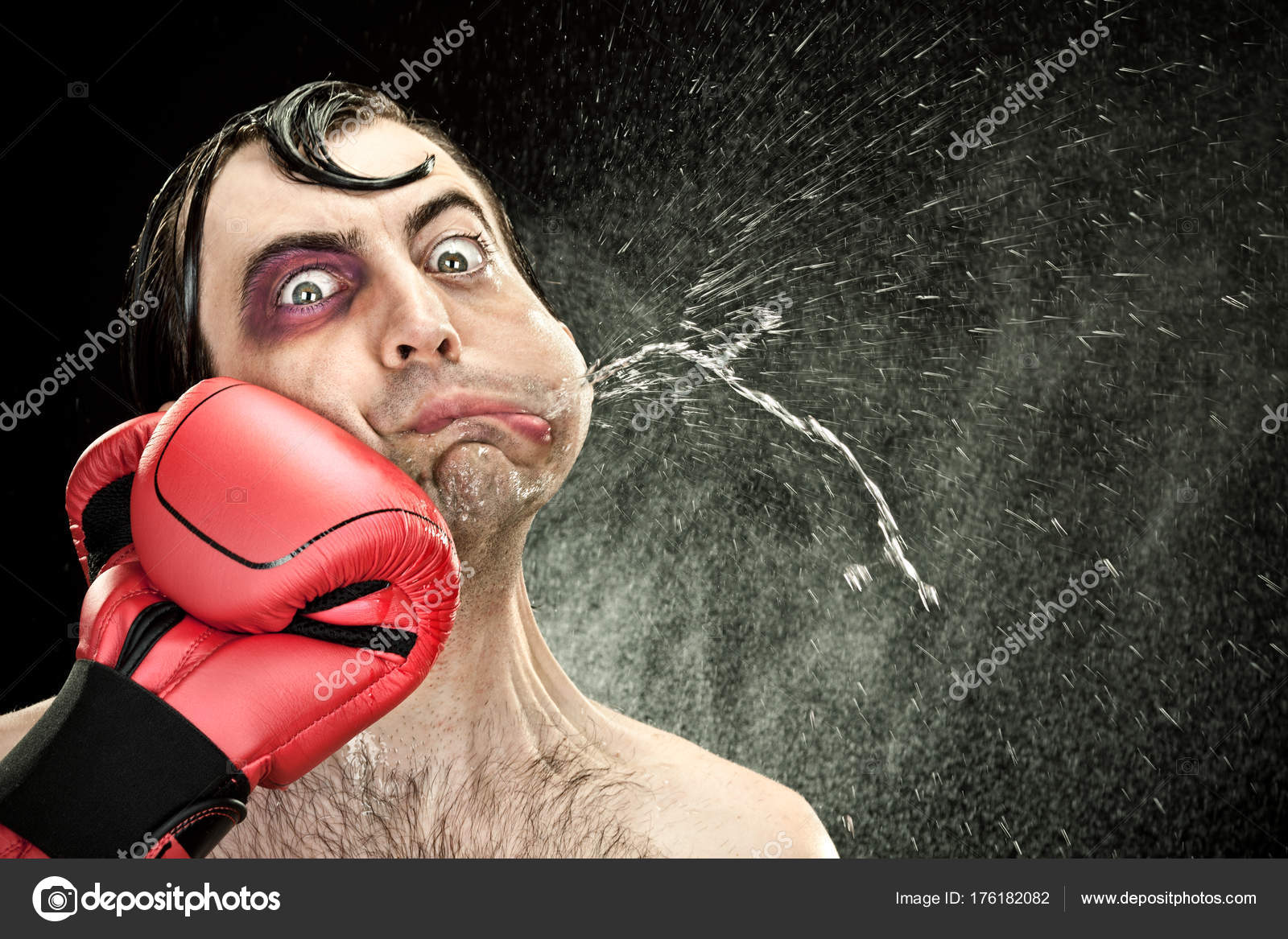 Black eye wound boxer spit due big punch hit portrait Stock Photo by