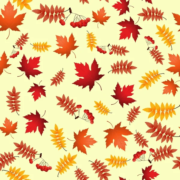 Patrón sin costura vectorial con hojas de otoño rojas y amarillas — Vector de stock