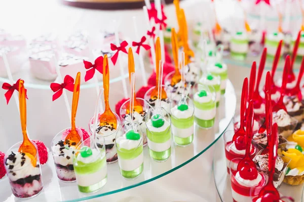 Different kinds of baked sweets on a buffet — Stock Photo, Image