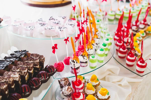 Different kinds of baked sweets on a buffet — Stock Photo, Image