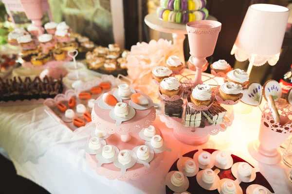 Different kinds of baked sweets on a buffet — Stock Photo, Image