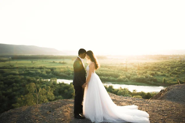 Wedding couple holding hands, groom and bride together on wedding day — Stock Photo, Image