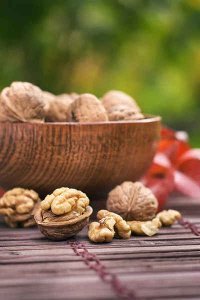 Walnuts in wooden bowl — Stock Photo, Image