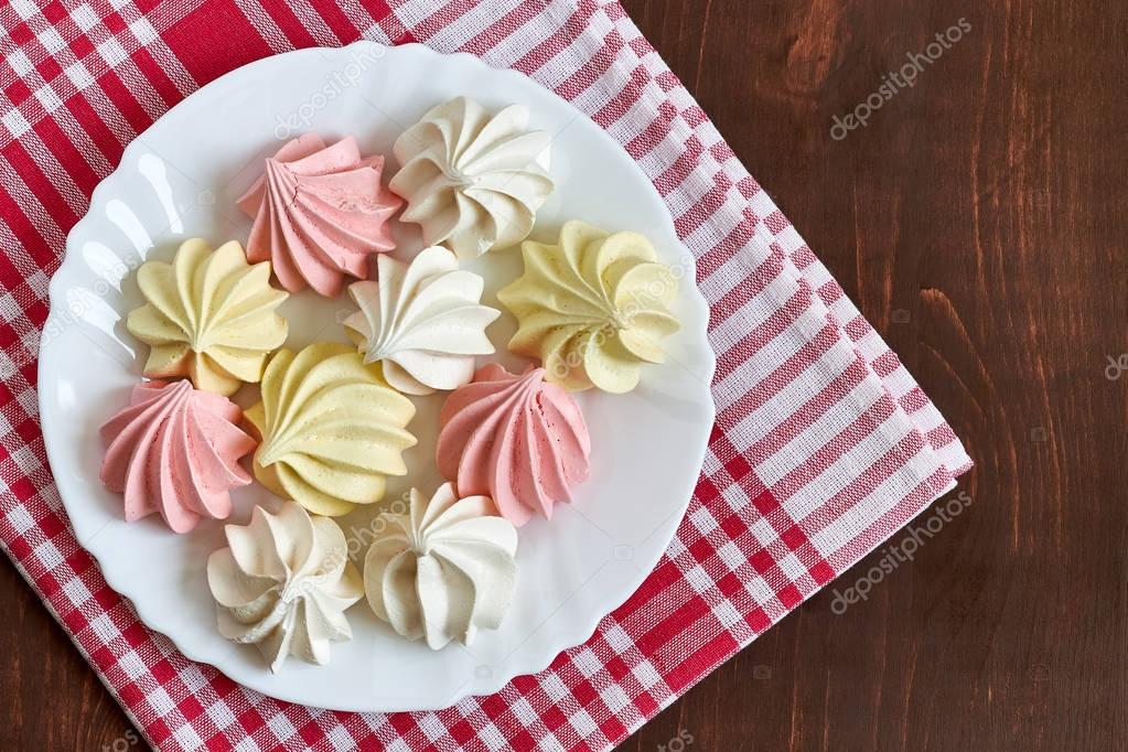 Colored meringue cookies Stock Photo by ©NedoB 130063624