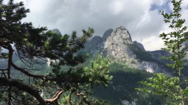 This stock video features a spectacular panning shot of majestic mountains. It can be useful for intros, presentations, title reveals and much more