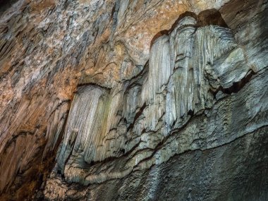 Stalactite wall in Valporquero's cave in Leon (Spain) clipart