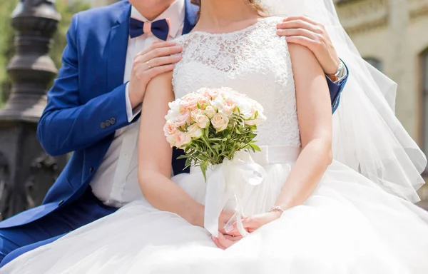 The groom took the bride by the shoulders — Stock Photo, Image