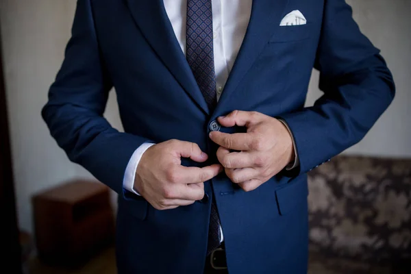 Man Fastens Suit Jacket — Stock Photo, Image