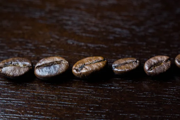 Coffee Grains Wooden Background — Stock Photo, Image