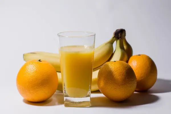 Banane Und Orangensaft Glas — Stockfoto